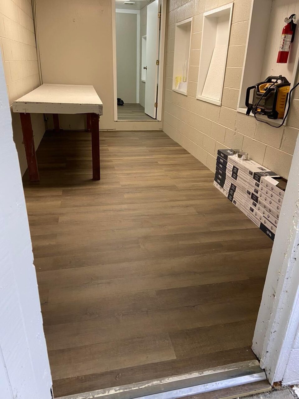 Finished vinyl plank floor in a commercial room