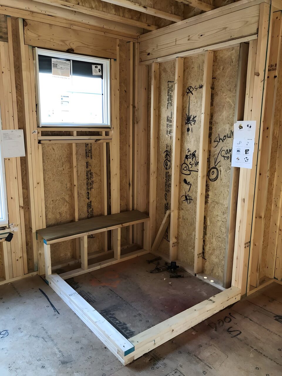 Wood framing prepared for a custom shower