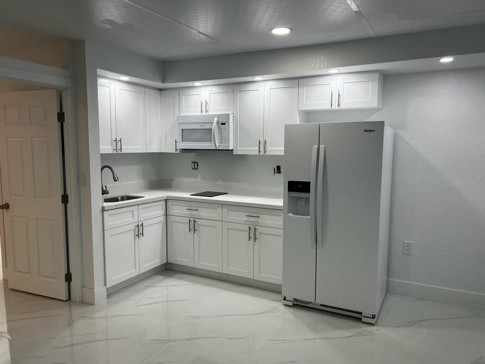 Finished white residential kitchen
