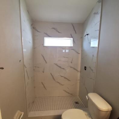 Finished walk-in shower and toilet